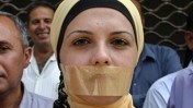 עיתונאים פלסטינים מפגינים נגד התקפות על עיתונאים. עזה, 3.8.08 (צילום: פאדי עדוואן)