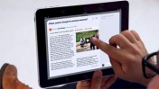 גולש קורא עיתון באפליקציית פליפבורד באייפאד (צילום מסך)