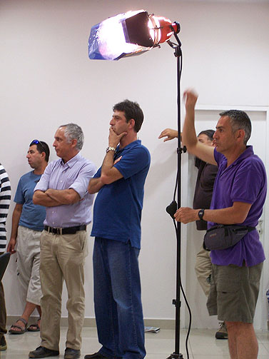 העוזר הבכיר למנכ"ל הרשות זליג רבינוביץ' (במרכז) ומנהל קול-ישראל מיקי מירו (לצדו משמאל) באסיפה הכללית של מועצת העיתונות, יוני 2012 (צילום: "העין השביעית")