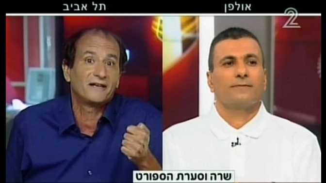 משה בוקר (מימין) ועמיר פלג בעימות טלוויזיוני (צילום מסך)