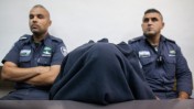 שוטר מג"ב החשוד בירי הקטלני בביתוניא, בית המשפט המחוזי בירושלים, 23.11.14 (צילום: יונתן זינדל)