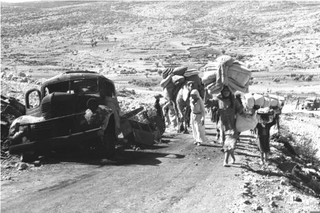 ערבים מהגליל עוזבים את כפריהם, 30.10.1948 (צילום: דוד אלדן, לע"מ)