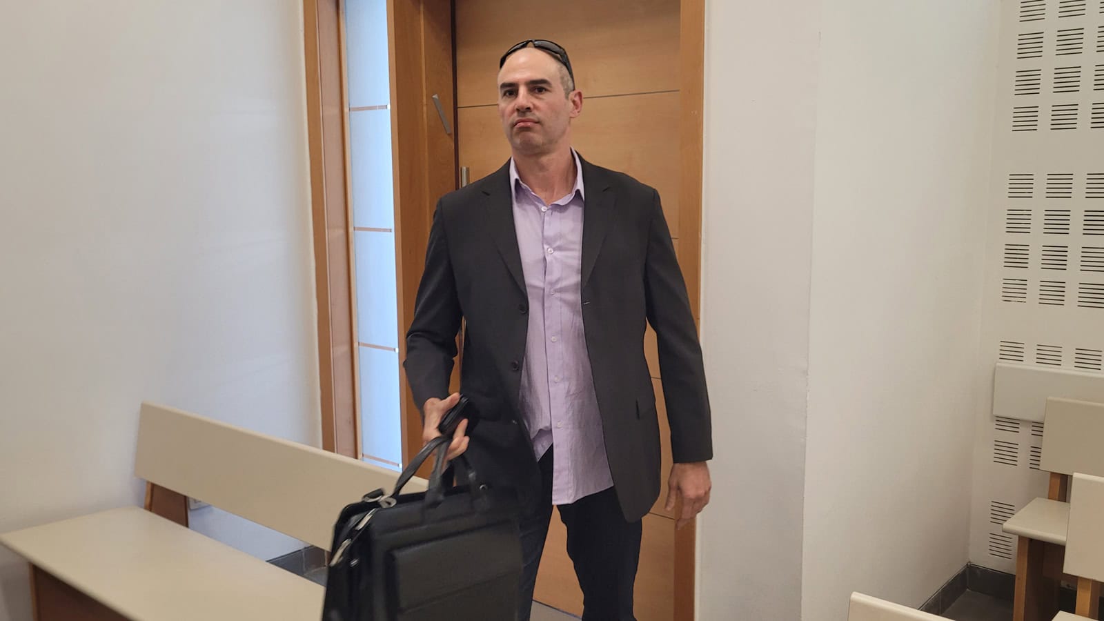 מיכאל סנילביץ', מנכ"ל עמותת "בני ברוך – קבלה לעם". בית המשפט המחוזי בלוד, 2.4.2025 (צילום: איתמר ב"ז)
