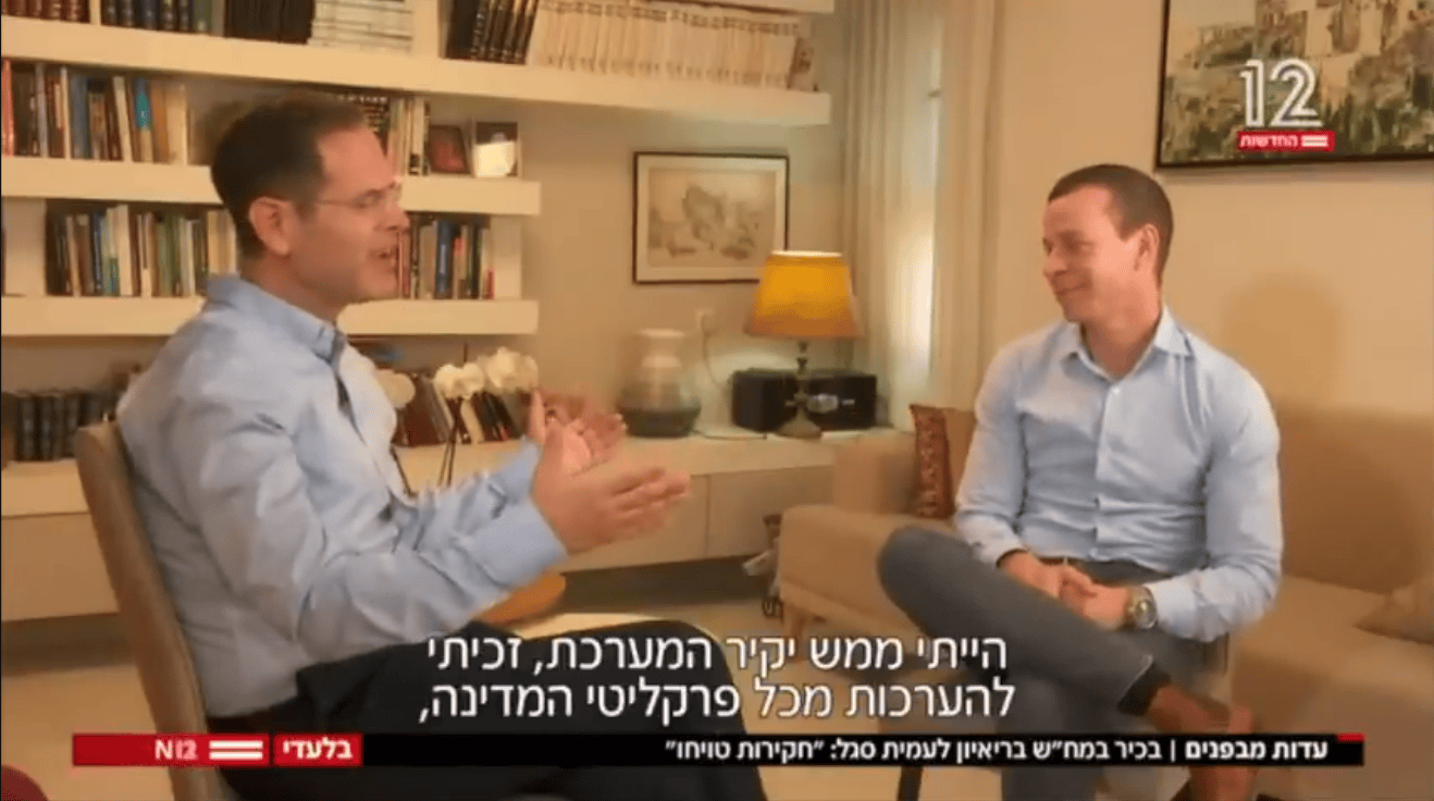 עמית סגל (מימין) מראיין את משה סעדה, חדשות 12, יולי 2022 (צילום מסך) עמית סגל (מימין) מראיין את משה סעדה, חדשות 12, יולי 2022 (צילום מסך)