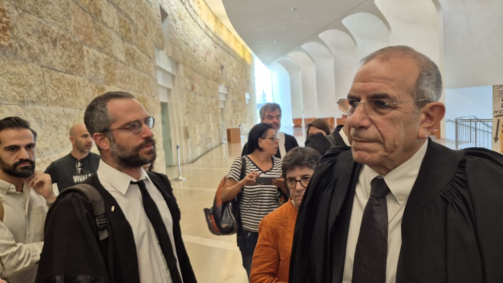 Attorney Gilead Sher (right), representing the Foreign Press Association, and Attorney Yonatan Nadav (left), representing the state, leaving the Supreme Court hearing on the petition to allow foreign journalists to enter Gaza, October 23, 2025.(Photo: Oren Persico)