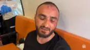 Photojournalist Mustafa al-Haruf after being beaten by Border Police officers, screenshot from Turkish television broadcasts