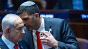 Israeli Prime Minister Benjamin Netanyahu speaks with Minister of Communications Shlomo Karhi during a 40 signatures debate, at the plenum hall of the Knesset, the Israeli parliament in Jerusalem, on January 5, 2026. Photo by Yonatan Sindel/Flash90